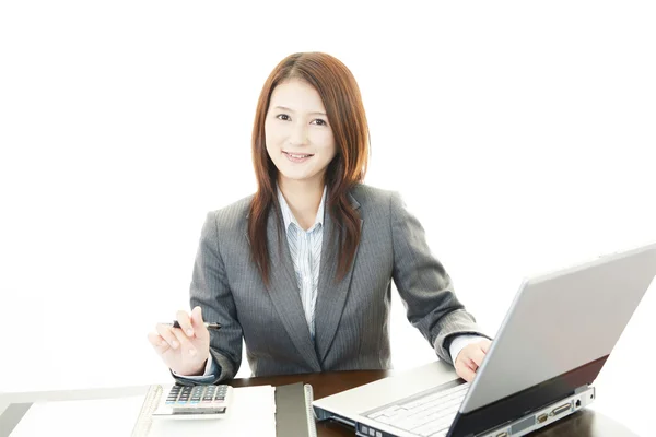 Business woman working on laptop — Stock Photo, Image