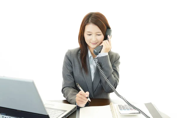 Mujer de negocios con teléfono —  Fotos de Stock