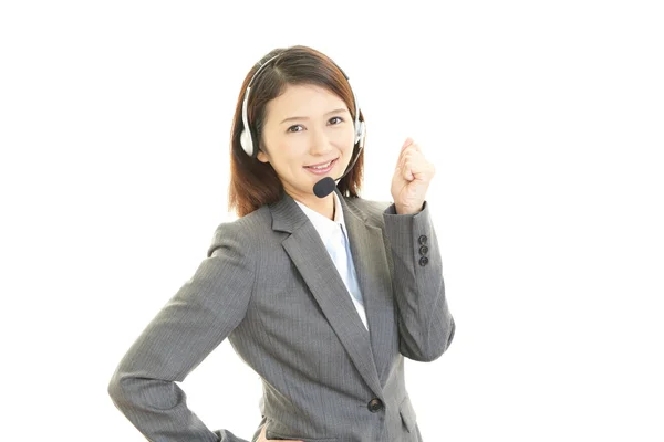 Smiling call center operator — Stock Photo, Image