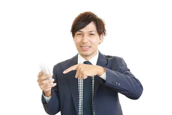 Homem de negócios feliz usando telefone celular — Fotografia de Stock