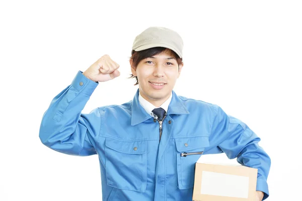 Smiling delivery man — Stock Photo, Image