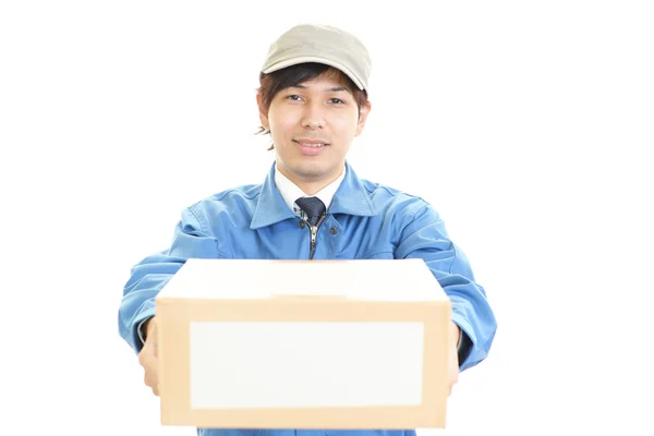 Smiling delivery man — Stock Photo, Image