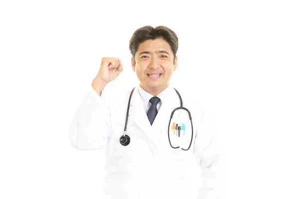 Sorridente medico asiatico — Foto Stock