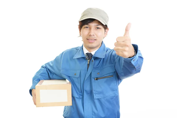 Smiling delivery man — Stock Photo, Image