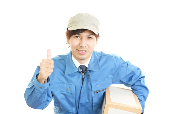 Smiling delivery man — Stock Photo, Image