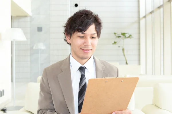 Sonriente asiático hombre de negocios — Foto de Stock