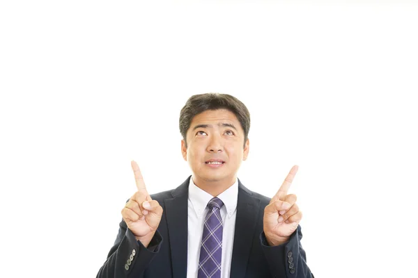 Smiling Asian businessman — Stock Photo, Image