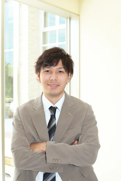 Sonriente asiático hombre de negocios — Foto de Stock