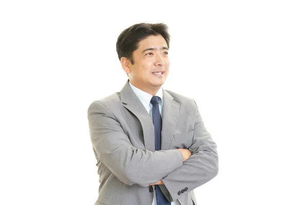 Souriant asiatique homme d'affaires — Photo
