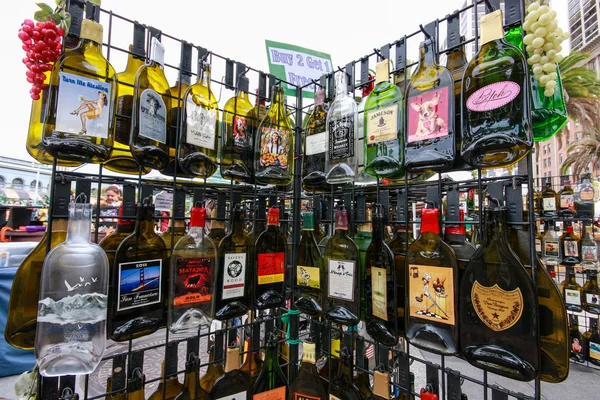 SAN FRANCISCO, CA, US - OCT 2, 2011: Rack with empty flat souvenir popular alcohol drinks bottles for tourist shopping in San Francisco on October 2, 2011 — Stock Photo, Image