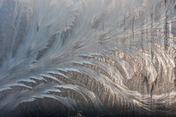 Winter frostwork on window glass — Stock Photo, Image