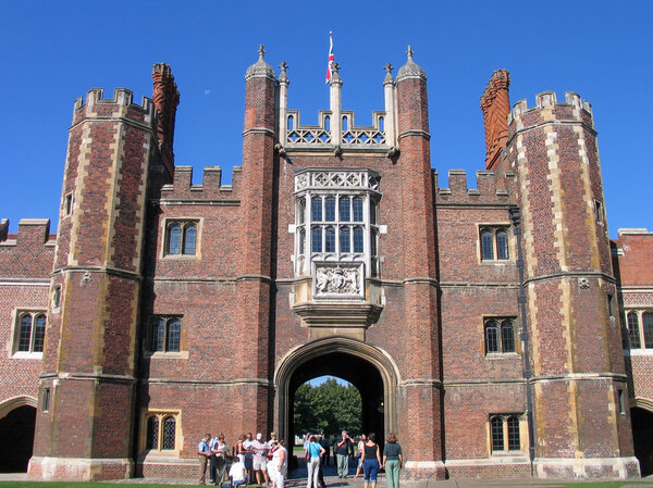 LONDON, UNITED KINGDOM - SEPT 5, 2004:  People look at Entrance to Hampton Court Palace Home of Henry VIII on Sept 5, 2004 in borough Richmond upon Thames, London, United Kingdom