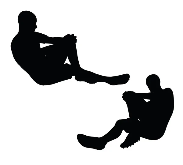 Silhouette de footballeur en noir — Image vectorielle