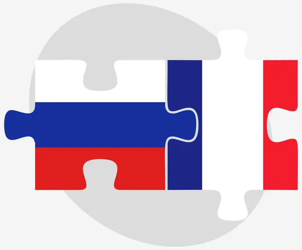 Fédération de Russie et France Drapeaux en puzzle — Image vectorielle