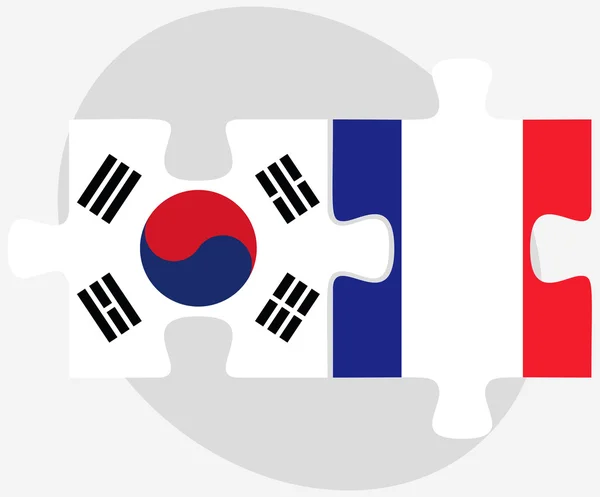 Zuid-Korea en Frankrijk vlaggen in puzzel — Stockvector