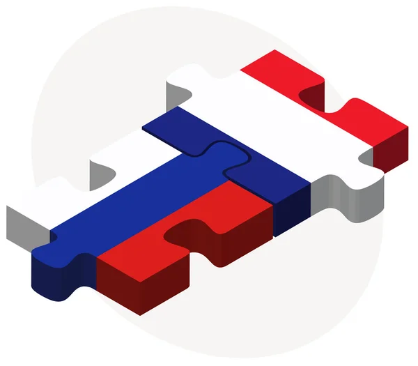 Russische Federatie en Frankrijk vlaggen in puzzel — Stockvector