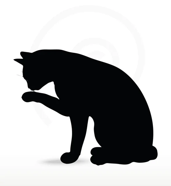 Vector afbeelding - kat silhouet in schoonmaken Paw pose — Stockvector