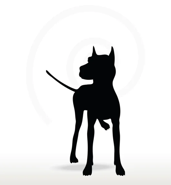 Silhouette de chien dans la pose de jambe surélevée — Image vectorielle