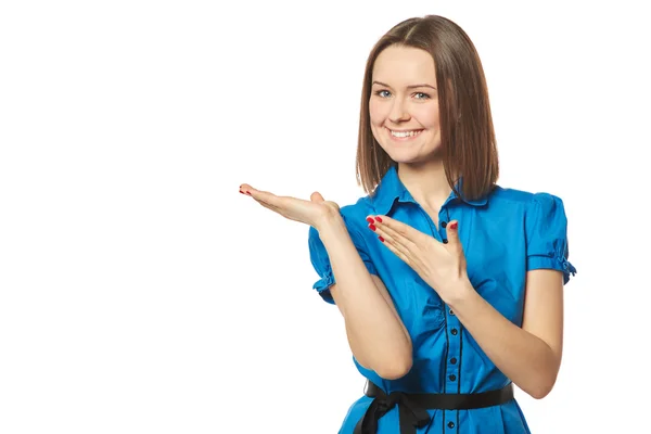 Young woman points to a product — Stock Photo, Image