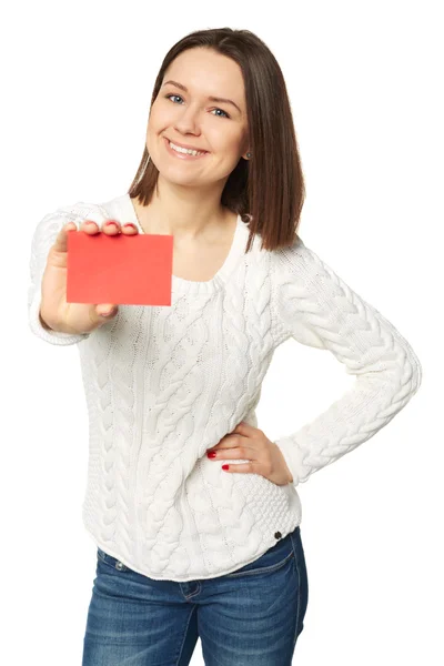 Young woman holding empty credit card, over white background — Stock Photo, Image