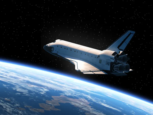 Transbordador espacial orbitando la Tierra Imagen de stock