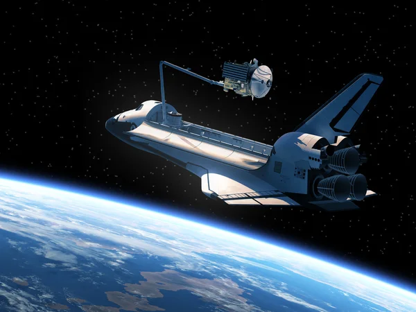 Transbordador espacial desplegando satélite — Foto de Stock