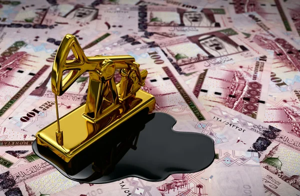 Abóbora de ouro e óleo derramado em riyals sauditas — Fotografia de Stock