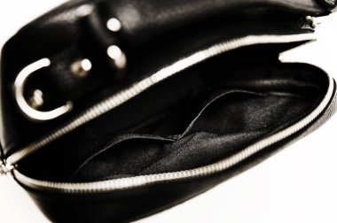 beautiful urban womens handbag. black handbag with texture on the skin. expensive womens handbag on a white background.