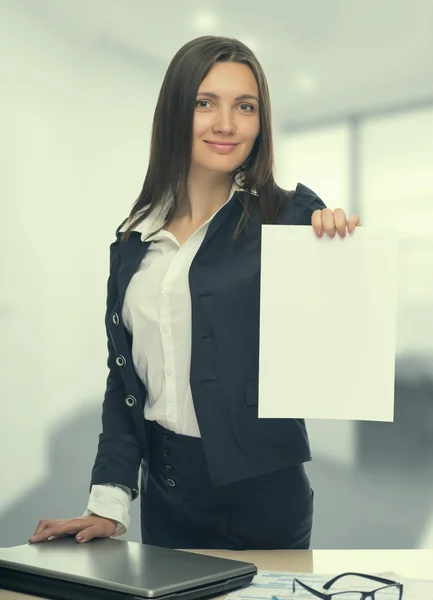 Secretary holding empty sheet of paper — Stock Photo, Image