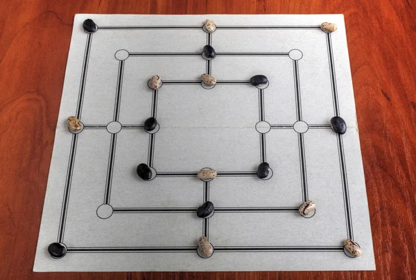 Traditional board for playing Nine Men's Morris game — Stock Photo, Image
