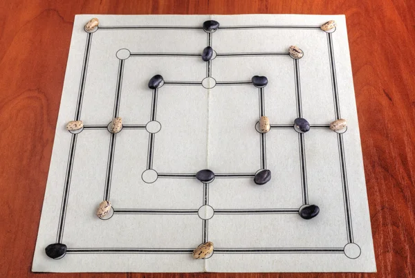 Traditional board for playing Nine Men's Morris game — Stock Photo, Image