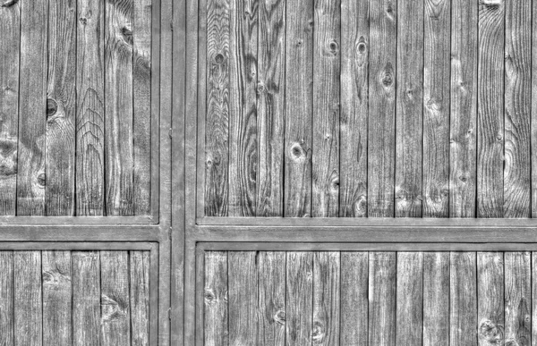 Wooden door with metal ornaments in black and white — Stock Photo, Image