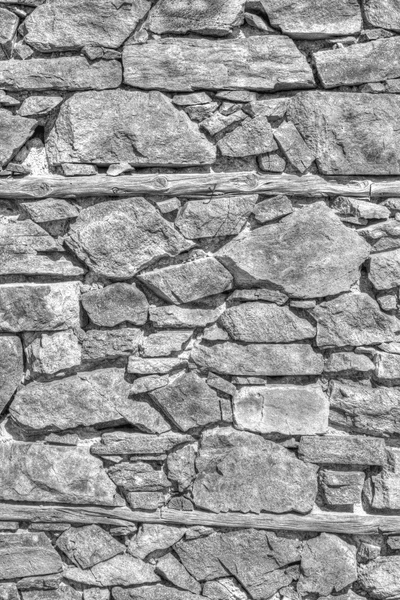 Parede de pedra fundo em preto e branco — Fotografia de Stock