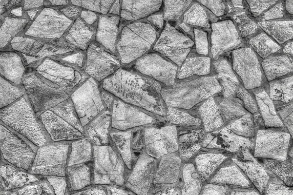 Parede de pedra fundo em preto e branco — Fotografia de Stock