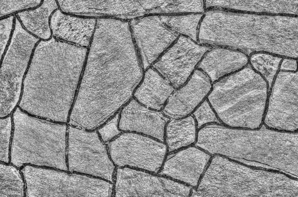 Stone wall background in black and white — Stock Photo, Image