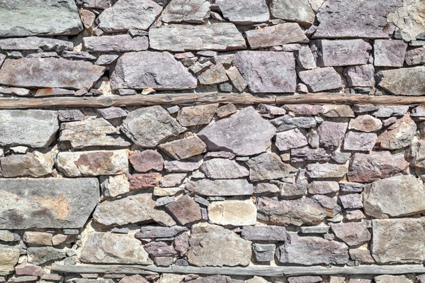Fondo de pared de piedra con vigas de madera —  Fotos de Stock