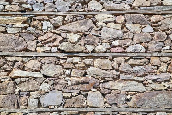 Fondo de pared de piedra con vigas de madera —  Fotos de Stock