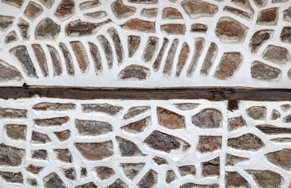 Fondo de pared de piedra con viga de madera —  Fotos de Stock