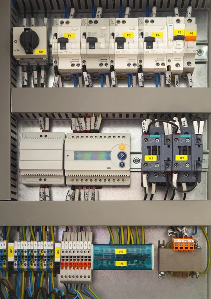 Relay cubicle with components and wires — Stock Photo, Image