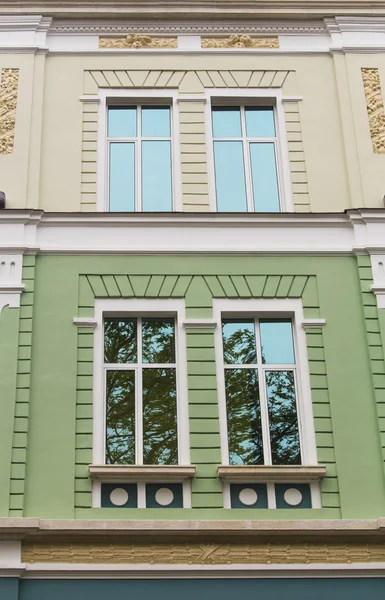 Facade of a building with windows — Stock Photo, Image