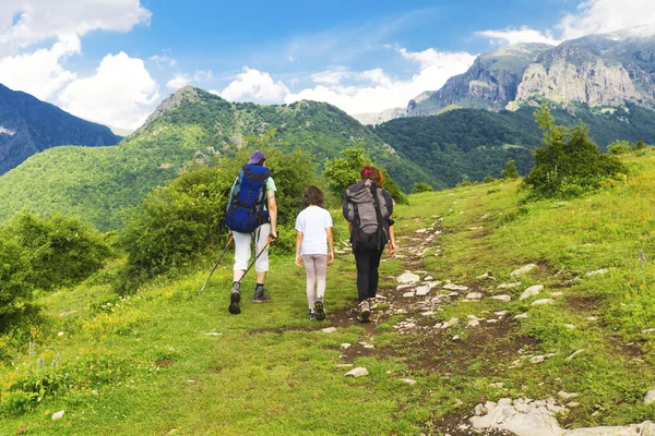 Family tourists in the mountain — Stock Photo, Image