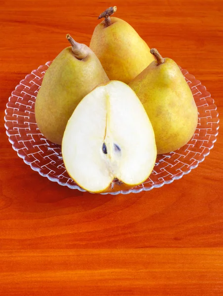 Fresh pears on wooden table — Stock Photo, Image