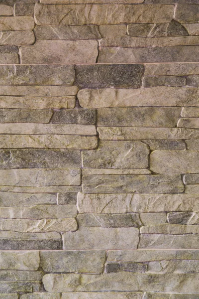 石のタイル壁のしっくいの装飾的なレリーフ — ストック写真