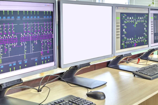 Ordenadores y monitores con diagrama esquemático de supervisión, control y adquisición de datos —  Fotos de Stock