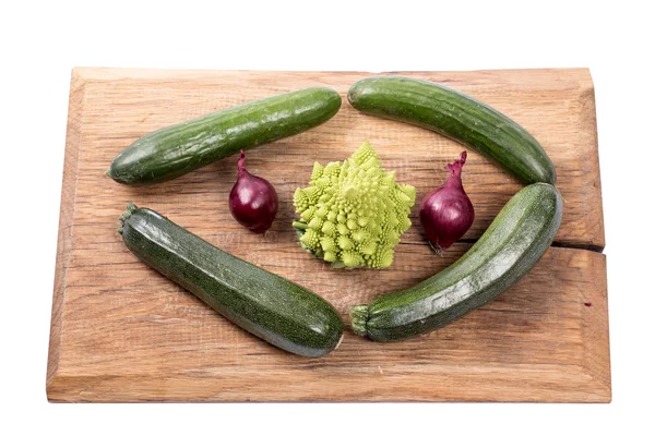 Vegetables on a wooden board — Stock Photo, Image