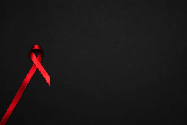 Apoio Hiv Símbolo Fita Vermelha Dia Mundial Hiv Fundo Preto — Fotografia de Stock