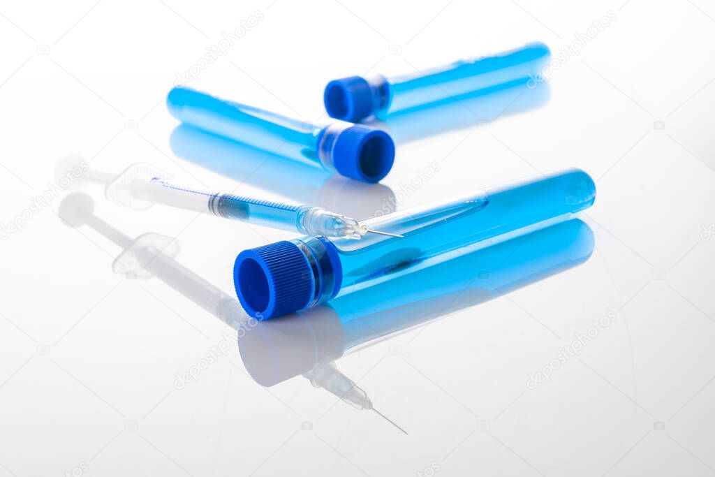 Medical equipment. Medical syringe with needle for protection flu virus and coronavirus. Covid vaccine on white. Disease care hospital prevention