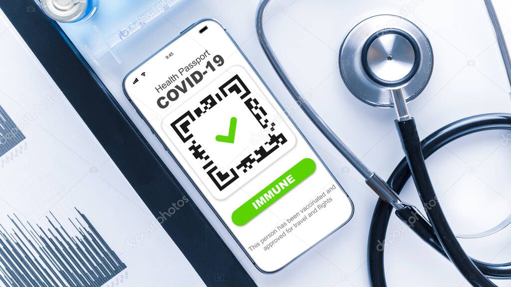 Covid certificate. Medical equipment with Coronavirus vaccination passport or vaccine certificate on phone screen, healthcare charts, syringe and doctor stethoscope on hospital white background