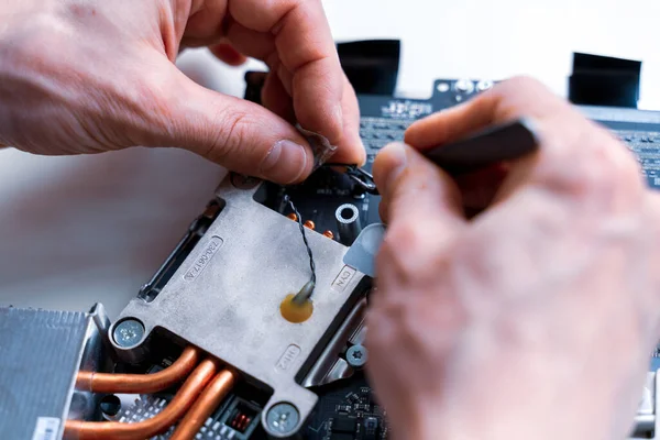 Computer service. Technology repair of pc electronic equipment. Technician engineer man do maintenance of hardware