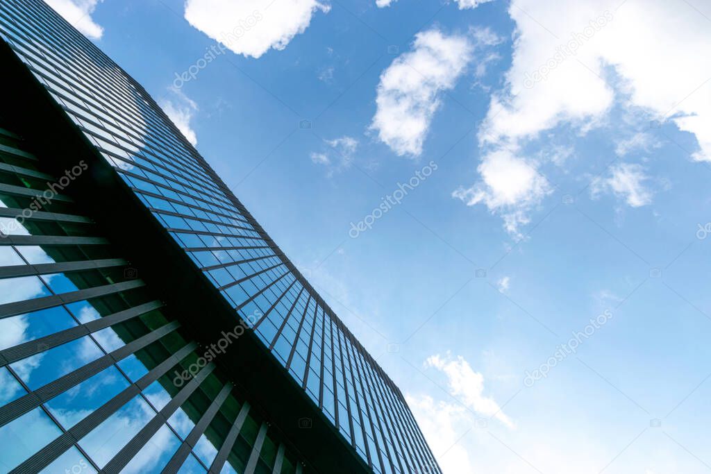 Office buildings. Finance corporate architecture city in abstract blue sky with nature cloud in sunny day. Modern office business building with glass, steel facade exterior